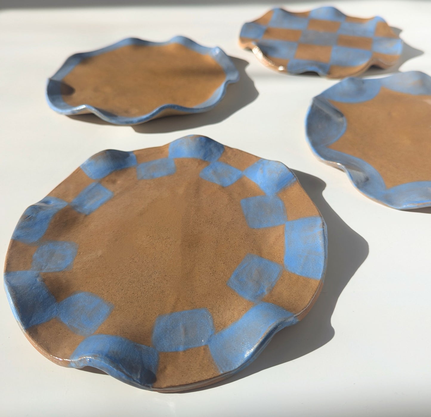 Set of Four Baby Blue Wavy Assorted Side Plates