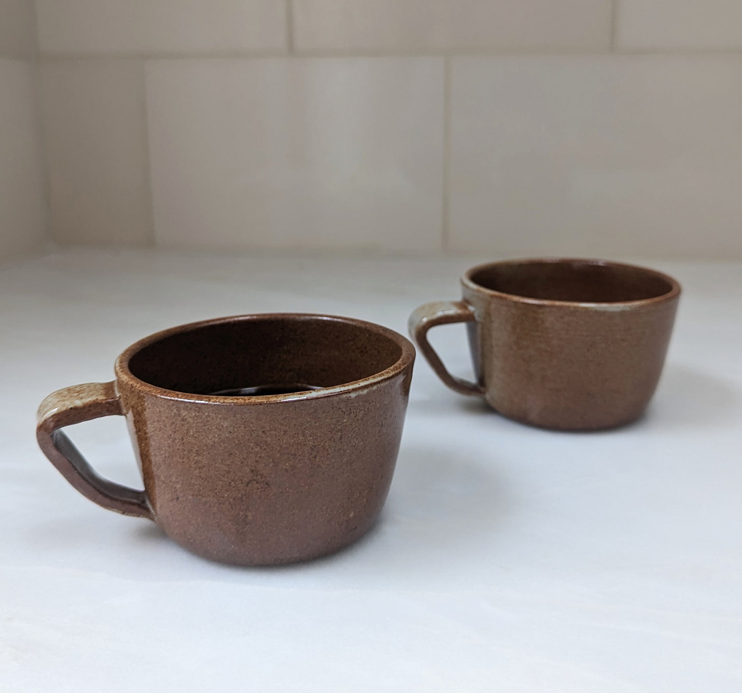 Pair of Ceramic Speckled Glaze Coffee Cups
