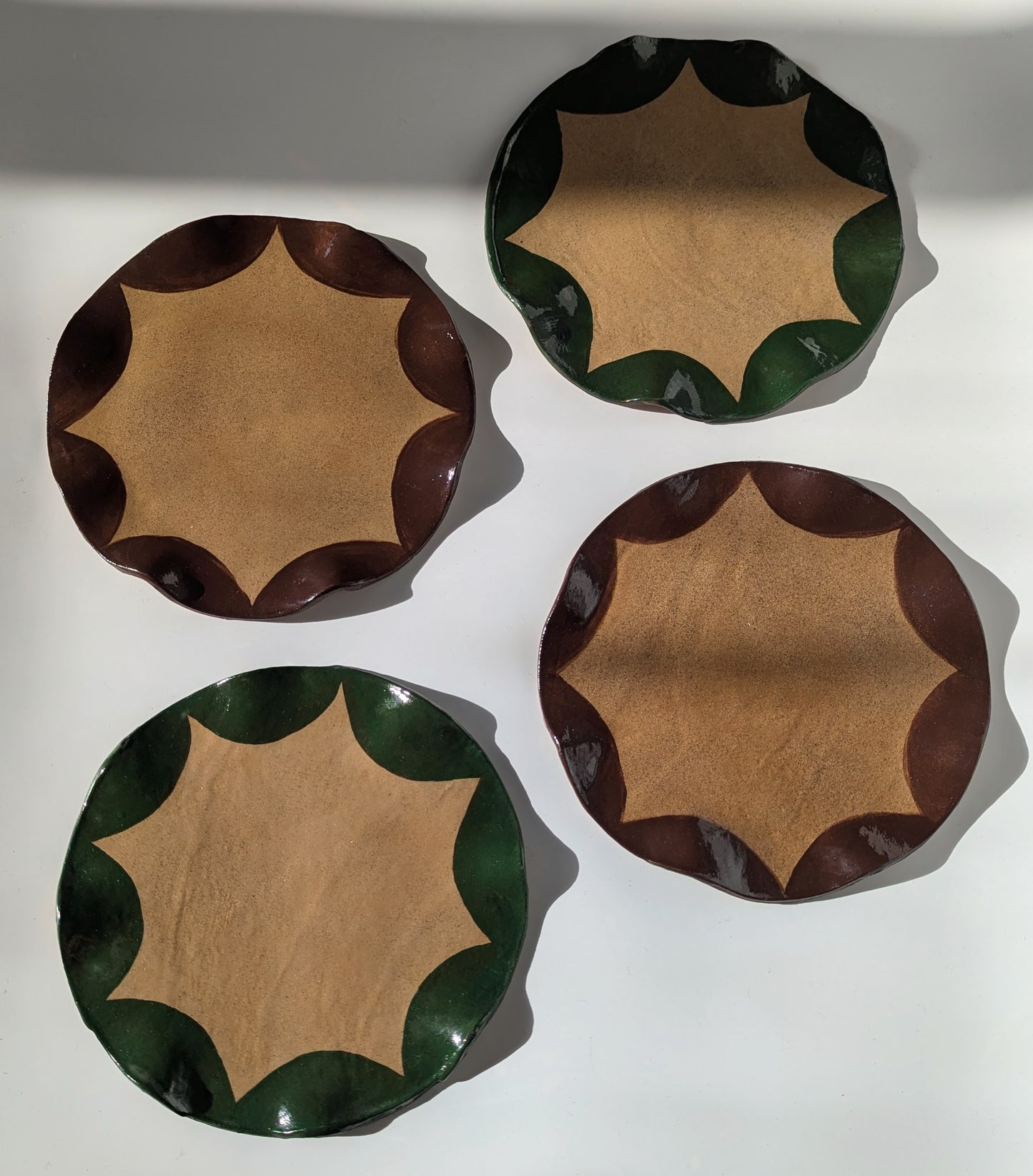 Set of Four Green & Brown Wavy Scalloped Side Plates