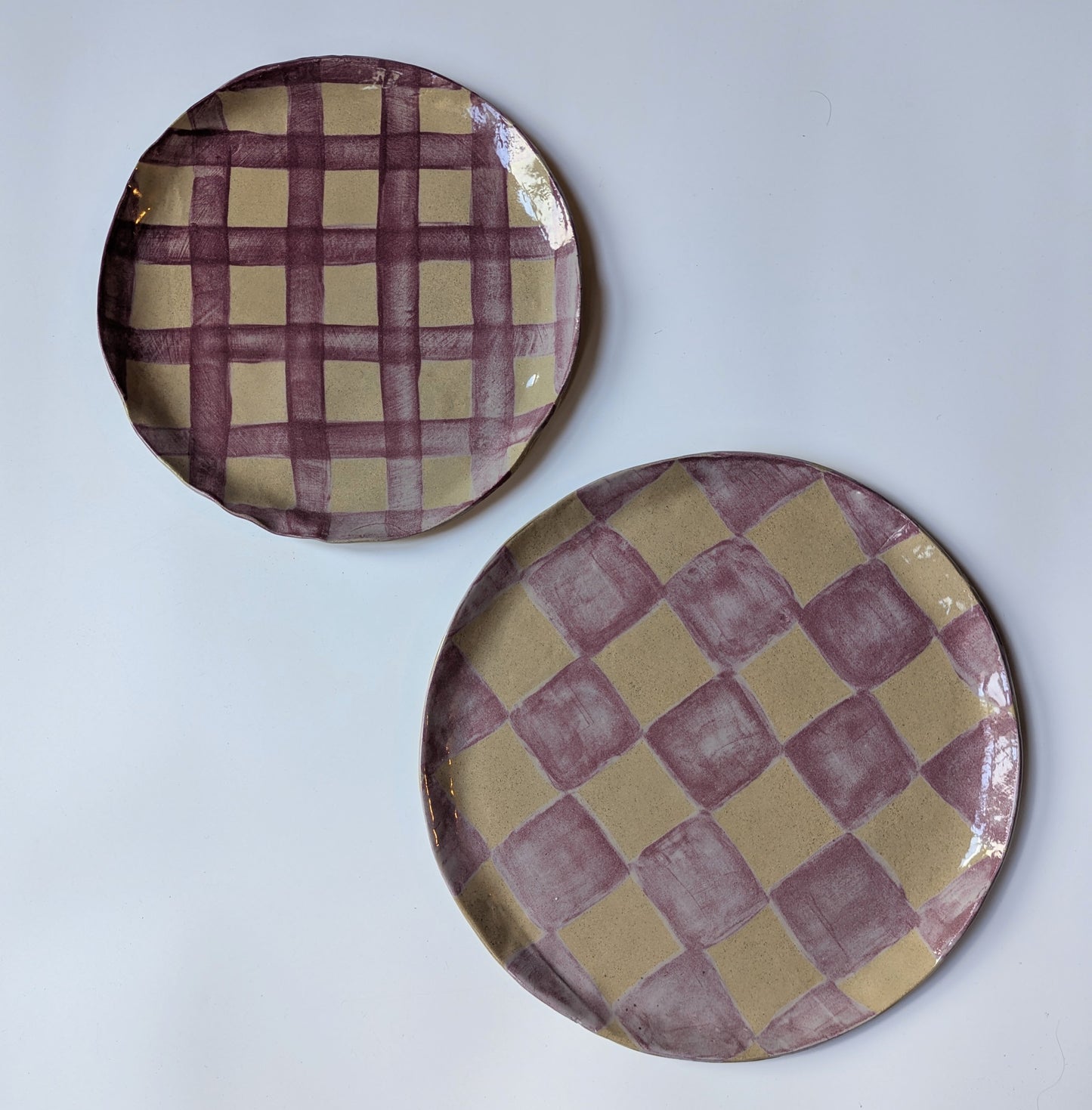 Pair of Round Burgundy Seconds Plates