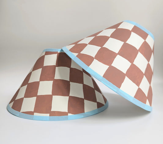 A Pair of Rust & Blue Checkerboard Hand Painted Coolie Lampshades